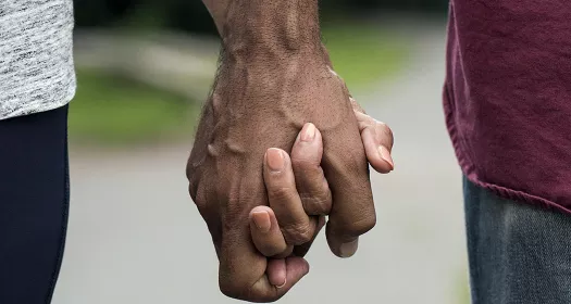 A couple holding hands