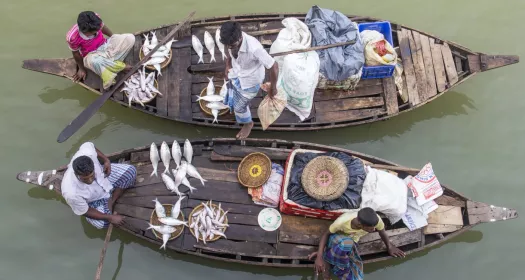 Fishers on a boat in Bangladesh
