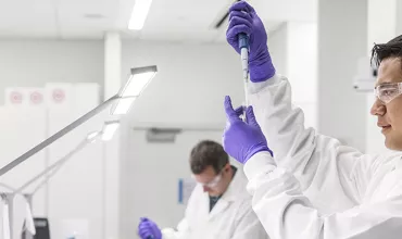Man scientists working in lab Man scientists working in lab