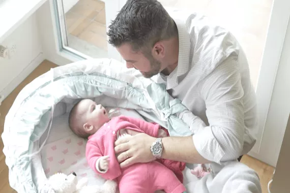 Michael sharing precious moments with his new son Our new parental leave policy helps Michael to share precious moments with his family